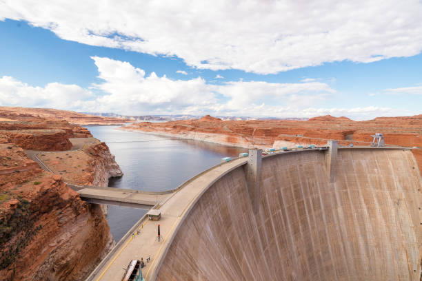 Glen Canyon Dam with Colorado River in Lake Powell at Page, Arizona. USA Glen Canyon Dam with Colorado River in Lake Powell at Page, Arizona. USA glen canyon dam stock pictures, royalty-free photos & images