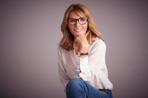 istock Happy woman studio portrait 1067151810