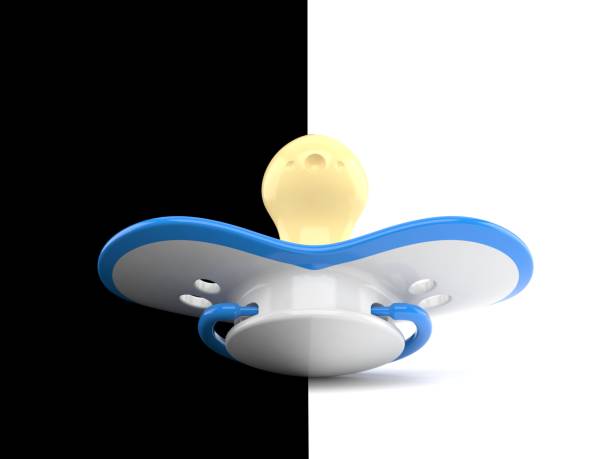 istock Baby dummy on black and white background 1067152592