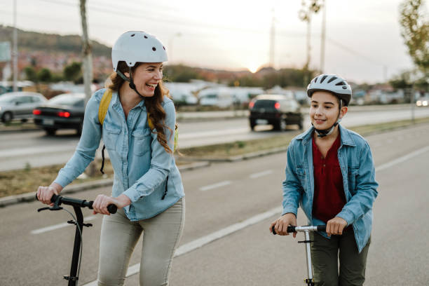 istock Together they ride scooters 1067153938