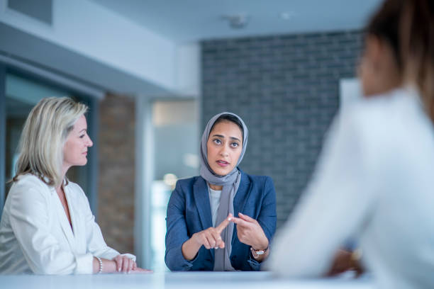 istock Woman leading a meeting 1067159418