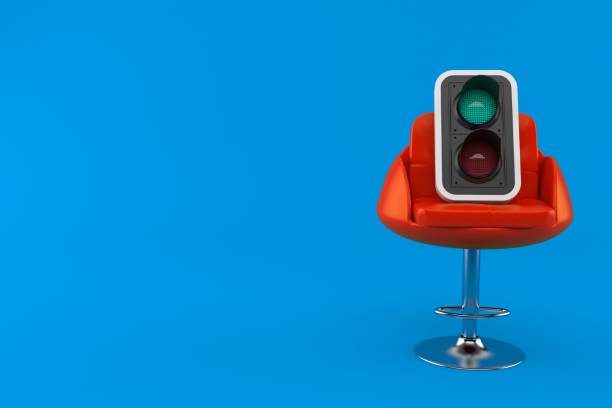 istock Green traffic light on barbershop chair 1067160276