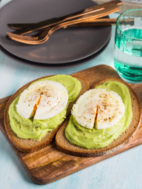 Rye bread avocado toasts with poached egg