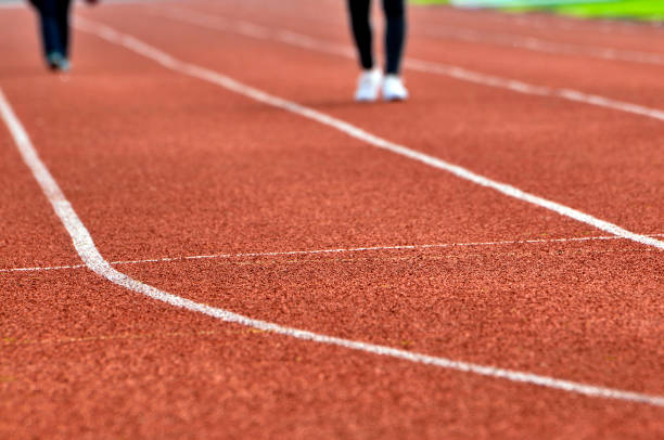 istock Young asian athlete training on running track 1067164416