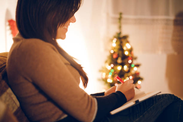 istock Woman writing something down in day planner 1067167380