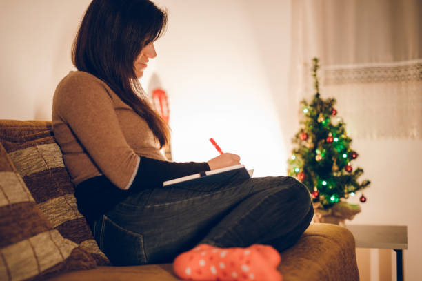istock Woman writing something down in day planner 1067167418