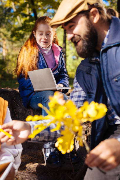 istock Cute positive nice girl holding her notebook 1067174696