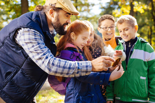 istock Nice bearded man pointing at the mushroom 1067177168