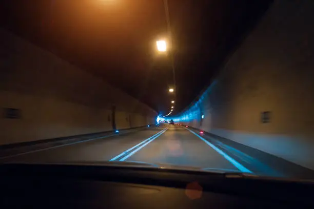 A blurred tunnel with incar view
