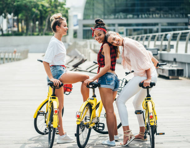 istock Beautiful women with bicycle rental 1067187726