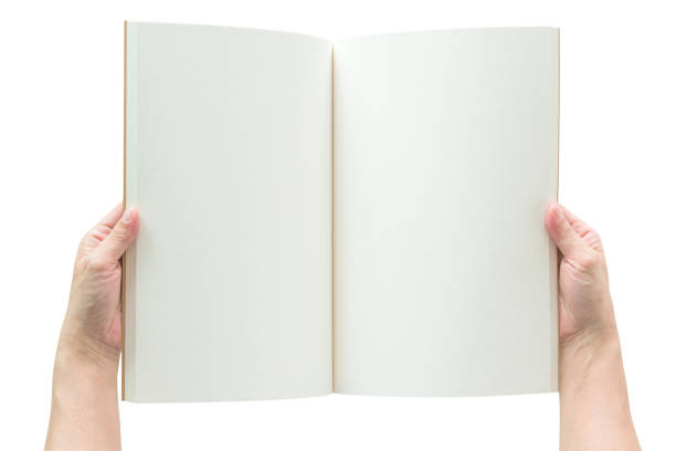 istock Blank open book mockup template in woman's hands with paper texture copyspace isolated on white background (clipping path) 1067203116
