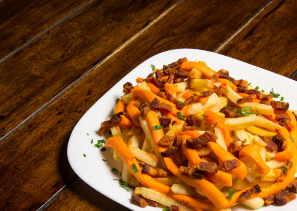 istock French fries filled with cheddar cheese and bacon 1067211136