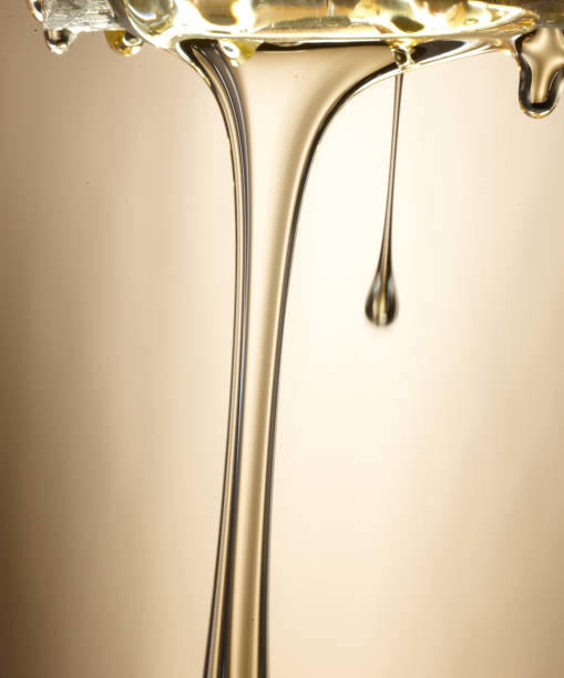 istock Honey Flows in Gold tone Background 1067215036