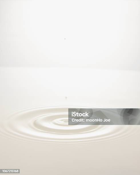 A Wave After The Drop Of Milk Stock Photo - Download Image Now - Milk, Rippled, Drop