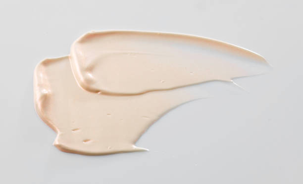istock Texture of Foundation Liquid, White Background 1067216498