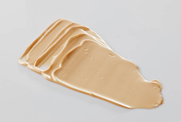 istock Texture of Foundation Liquid, White Background 1067216912