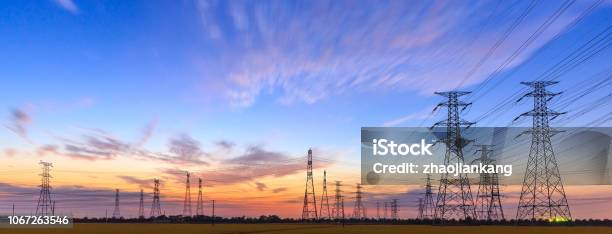 Highvoltage Power Lines At Sunset Stock Photo - Download Image Now - Power Line, Electricity, Electricity Pylon