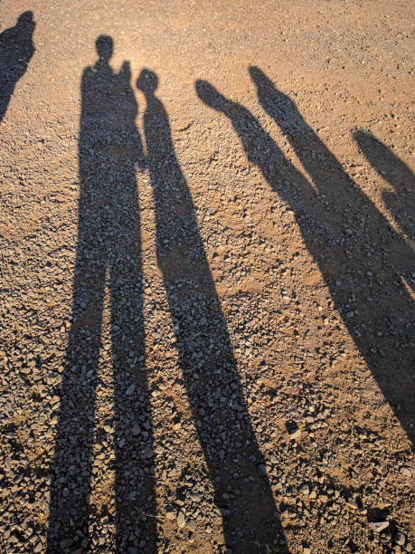 istock shadows of people 1067265442