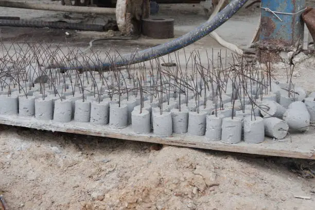Concrete covering,Construction work Small cement lumps for spacing the concrete structure at the construction site