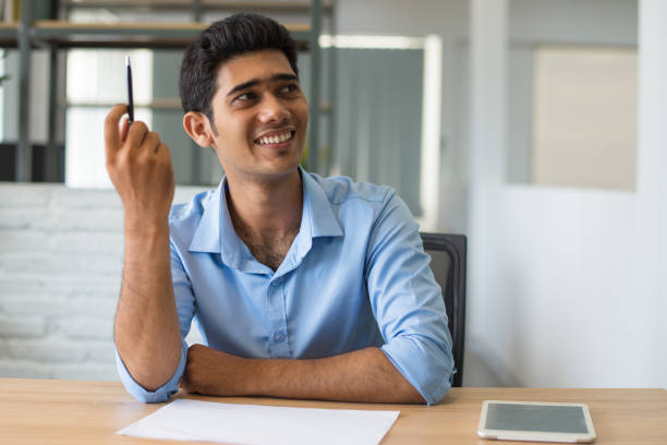 istock Happy creative manager offering idea at business meeting 1067269220