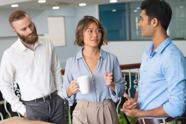 istock Business colleagues discussing work during coffee break 1067269290