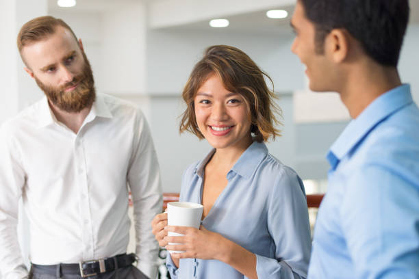 istock Multiethnic business group chatting during corporate meeting 1067269390