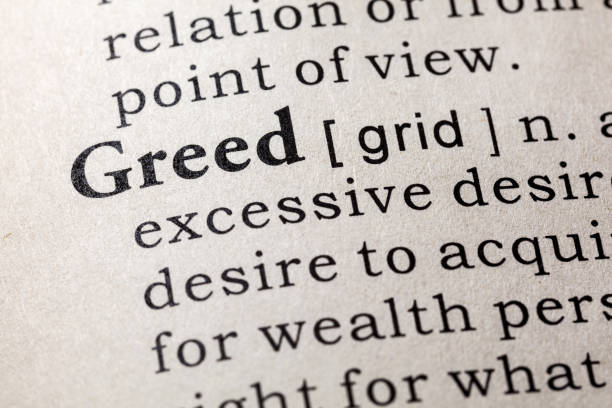 istock definition of greed 1067271740