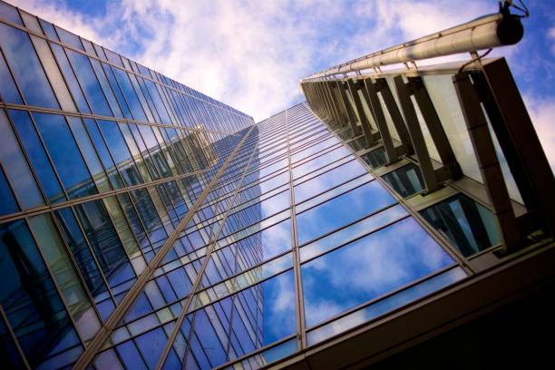 istock Infinite Glass Building looking up to the sky 1067274904