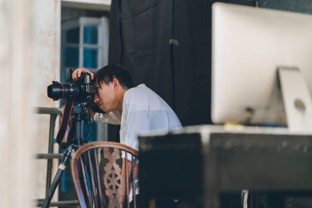 istock Professional photograher taking photos in his studio 1067278498