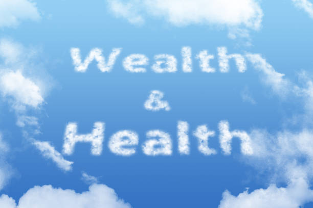istock wealth and health cloud text on bright blue sky 1067281916