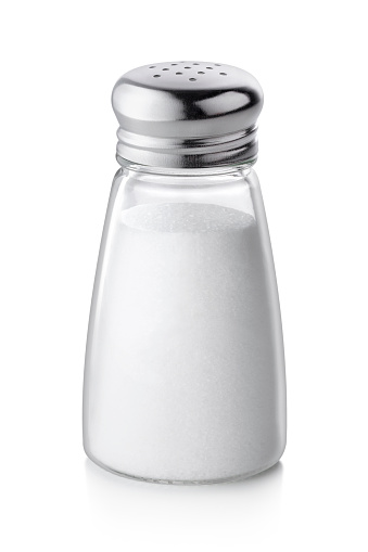 Coctelera de sal sobre fondo blanco photo
