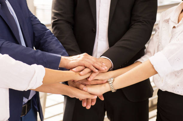 istock Business join hands success for dealing,Team work to achieve goals,Hand coordination 1067299342