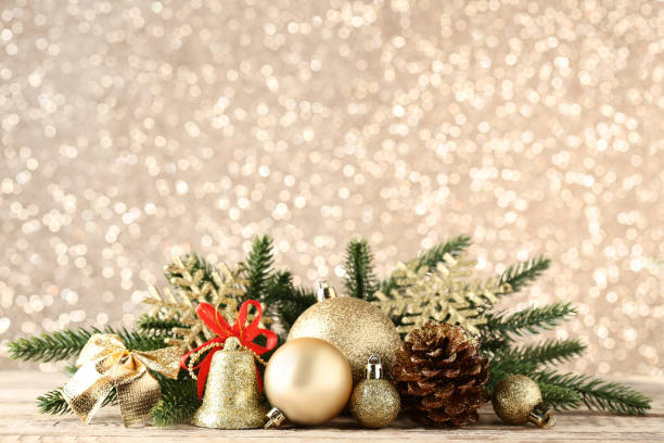 istock Christmas decorations with fir tree branches on bokeh background 1067305690