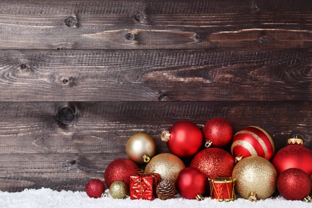 istock Christmas decorations on wooden background 1067307488
