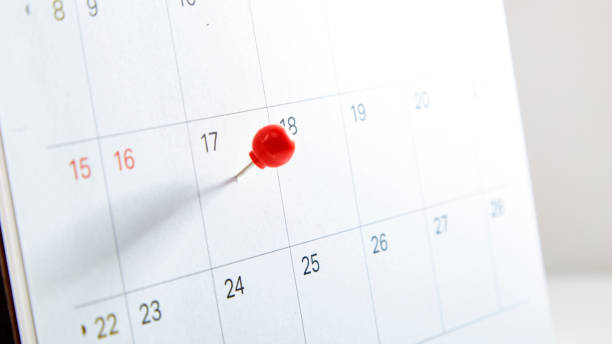 istock Red thumbtack a date 17th on calendar or planner 1067312646