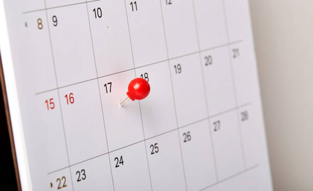 istock Red thumbtack a date 17th on calendar or planner 1067312662