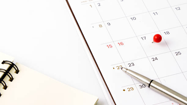 istock Red thumbtack a date 17th on calendar or planner 1067312712