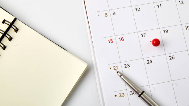 istock Red thumbtack a date 17th on calendar or planner 1067312844