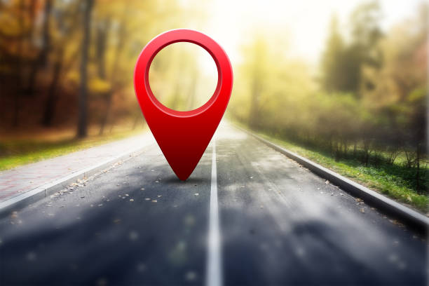 pin Red GPS pin on asphalt road and beauty autumn nature distance marker stock pictures, royalty-free photos & images
