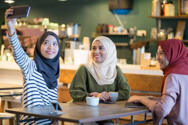 istock Group of friends in cafe 1067314756