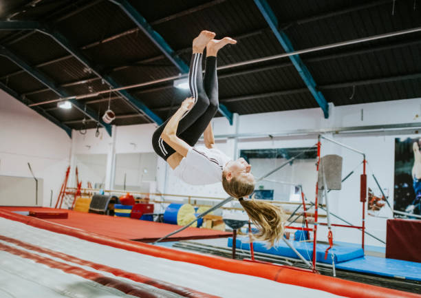 istock Female gymnast practicing a gymnastic 1067316670