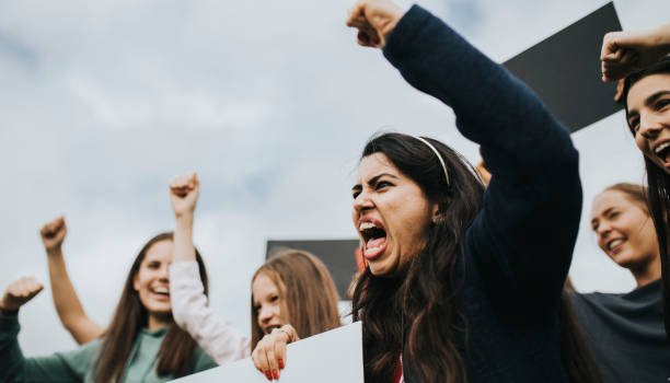 istock Group of angry female activists is protesting 1067317298