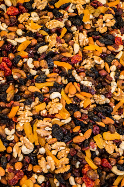 istock Pile of assorted nuts and seeds on display 1067328924