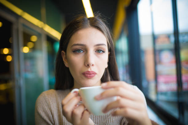 istock women who is enjoy in cafe 1067329242