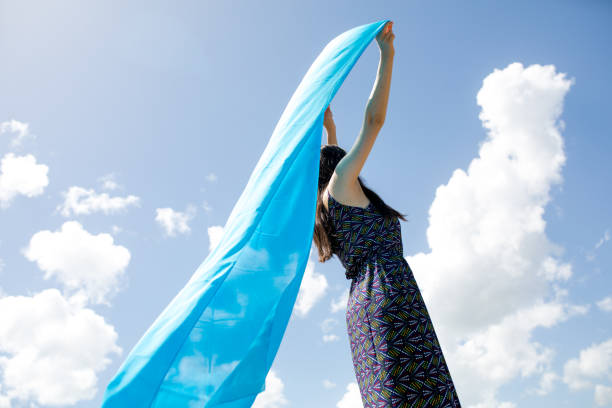 istock woman meditating in nature 1067330918