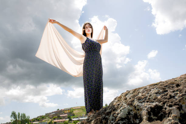 istock woman meditating in nature 1067330946