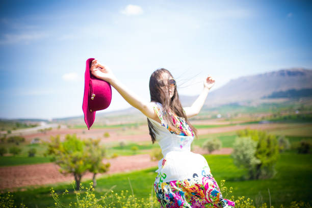 istock female model photography between flowers 1067331190