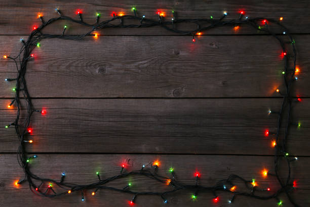 istock Christmas garland lights on grey background, copy space 1067331198
