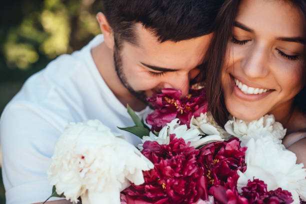 istock Young couple with posing on the camera. 1067335354