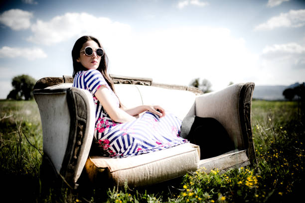 istock female model photography between flowers 1067337244
